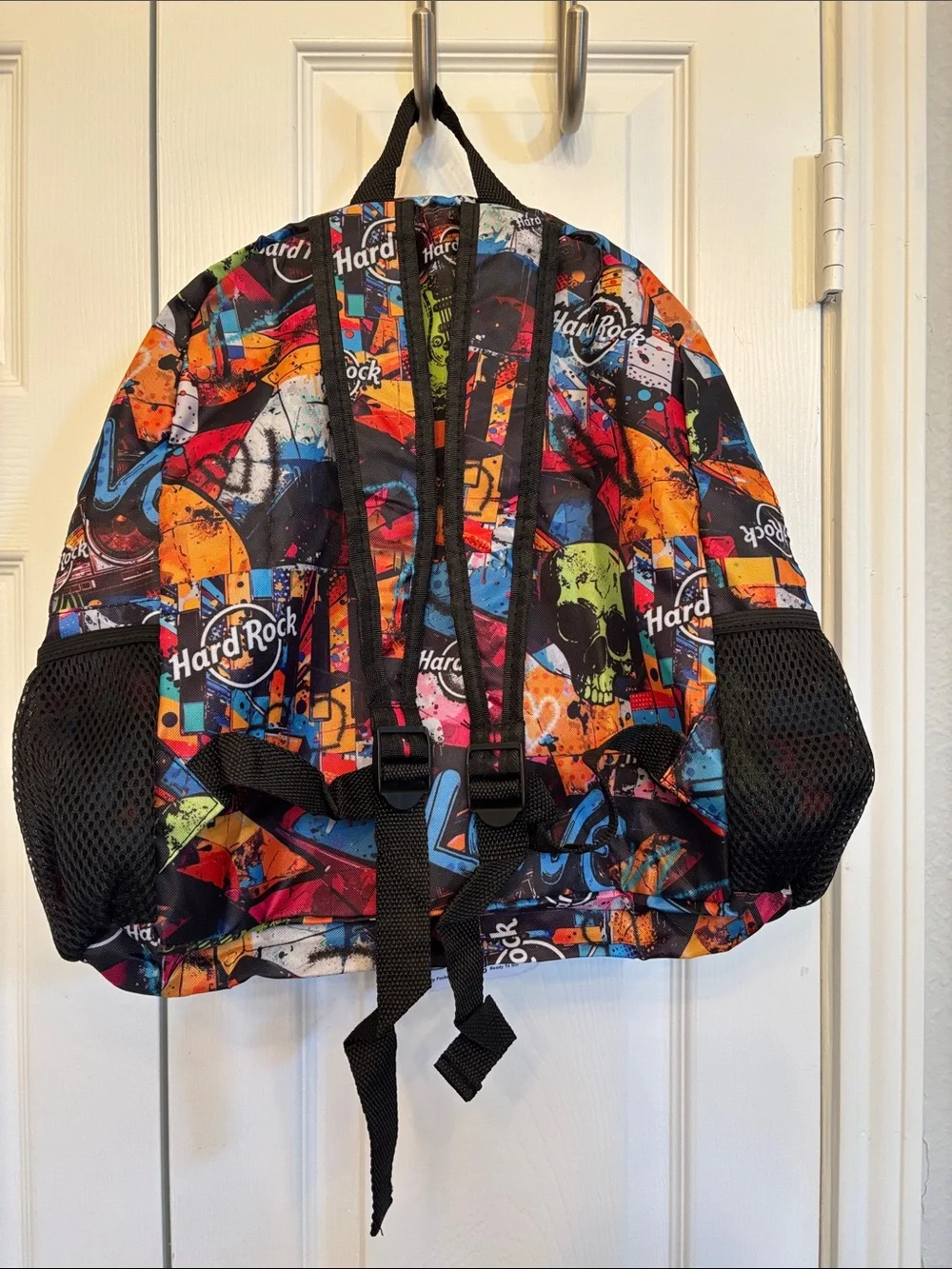 Hard Rock Cafe Multicolor Graffiti Skull Backpack with Neon Green Tag